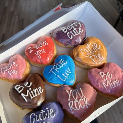 Heart-shaped Valentine's Day donuts with sweet messages